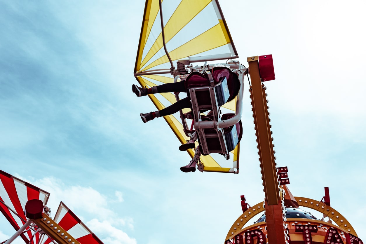 People riding in amusement park in Coney Island, New York